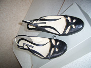 Босоножки на танкетке