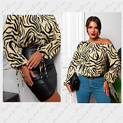 Блузка нарядная желтая тигровая